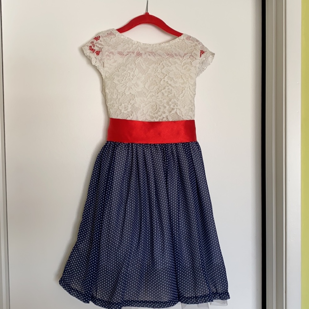Polka dot lace dress with silk white belt.